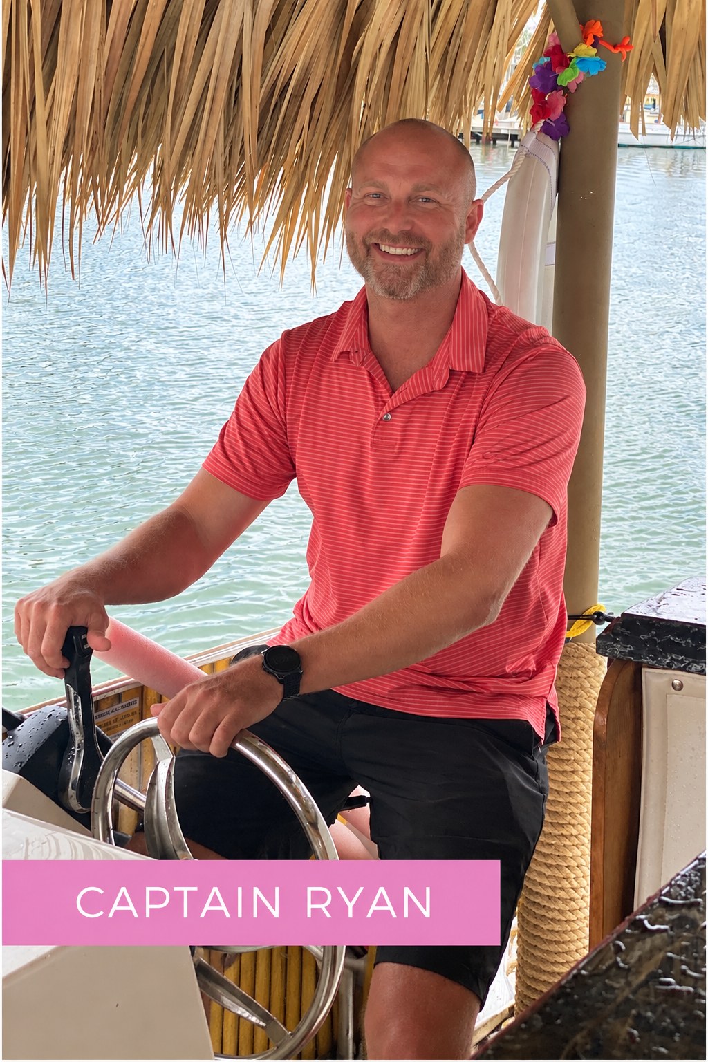 Captain Ryan at the helm of The Bach Boat in Destin